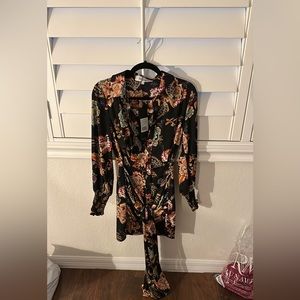 Brand new dress with Chinese style flower pattern. Never worn.
